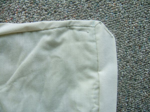 close-up of starting to fold miter 