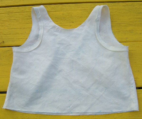 Back of F with neck hemmed and bias attached