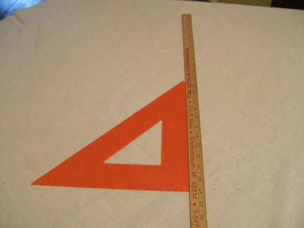using triangle and yardstick to mark line