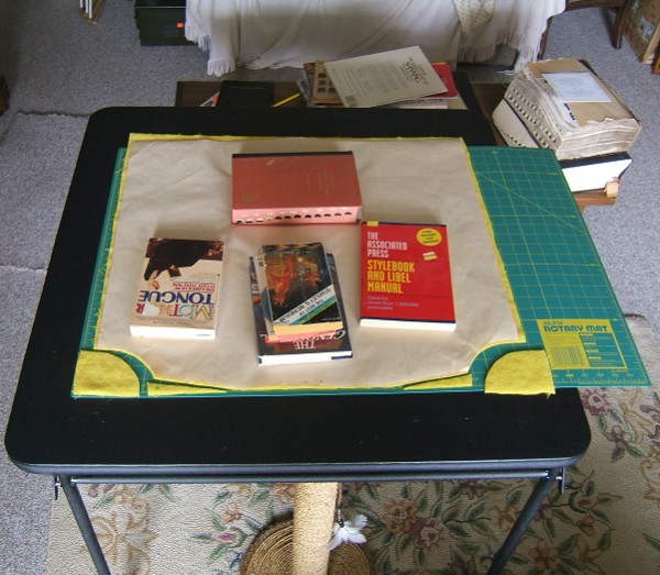 overhead shot of books on pattern after cutting