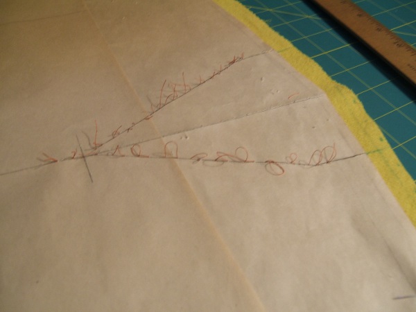 thread marking lower leg of dart