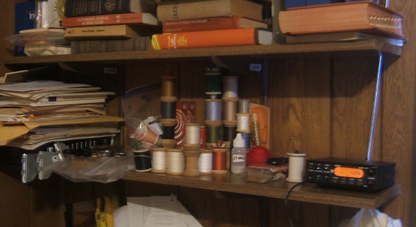 spools on bookshelf