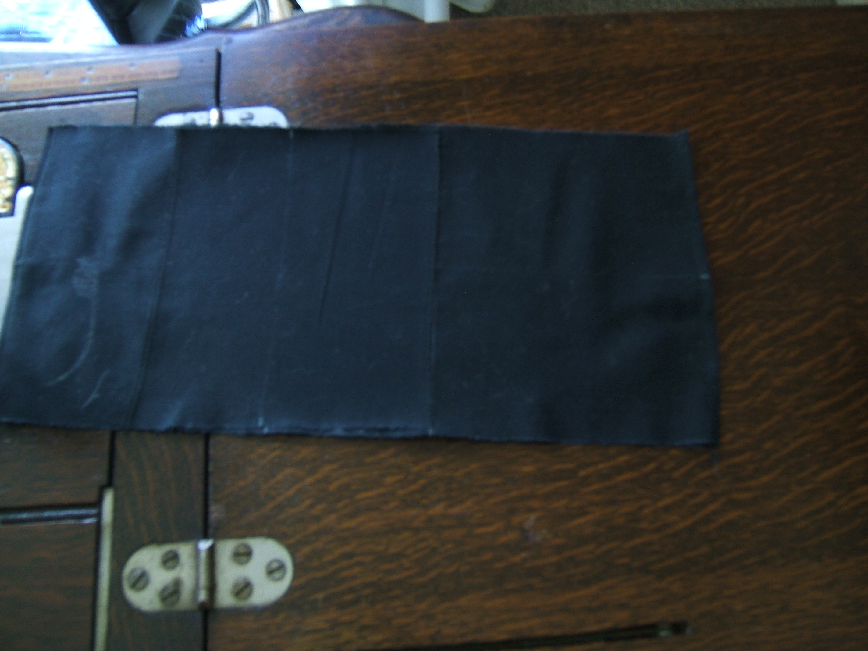 on machine, preparing to attach pockets, dark